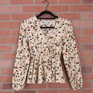 Long Sleeve Ivory Peplum top